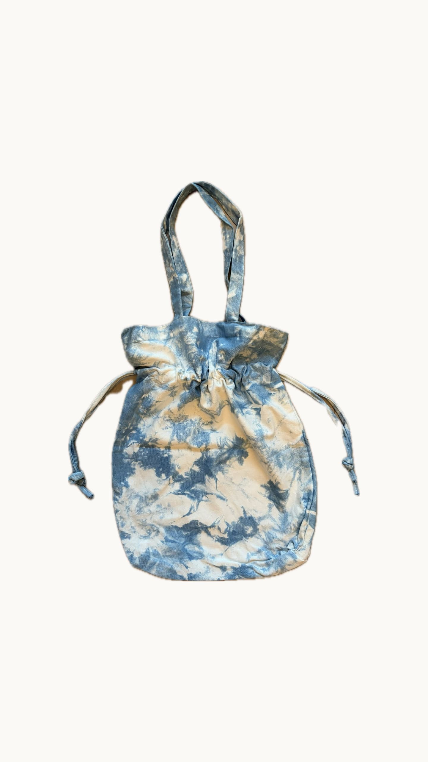 Cinched indigo drawstring pouch